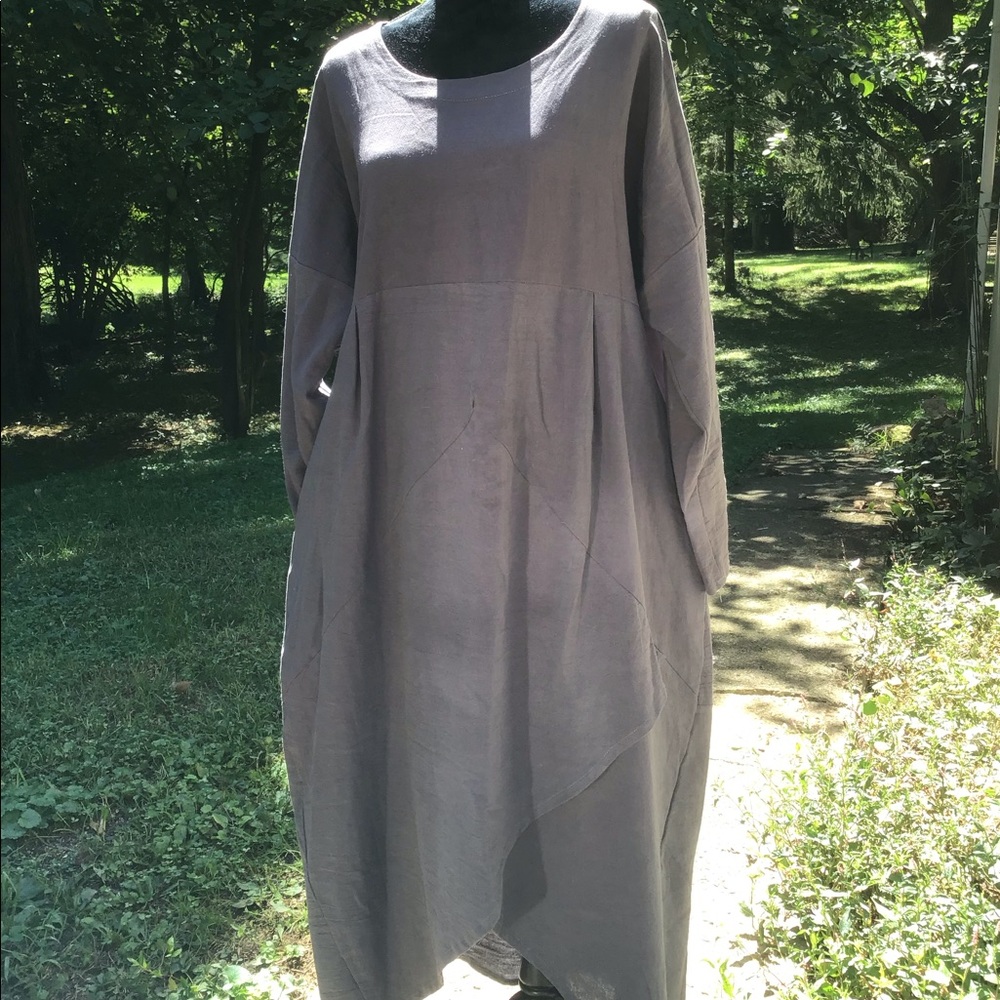 Zanzea long sleeve dress with split hem.